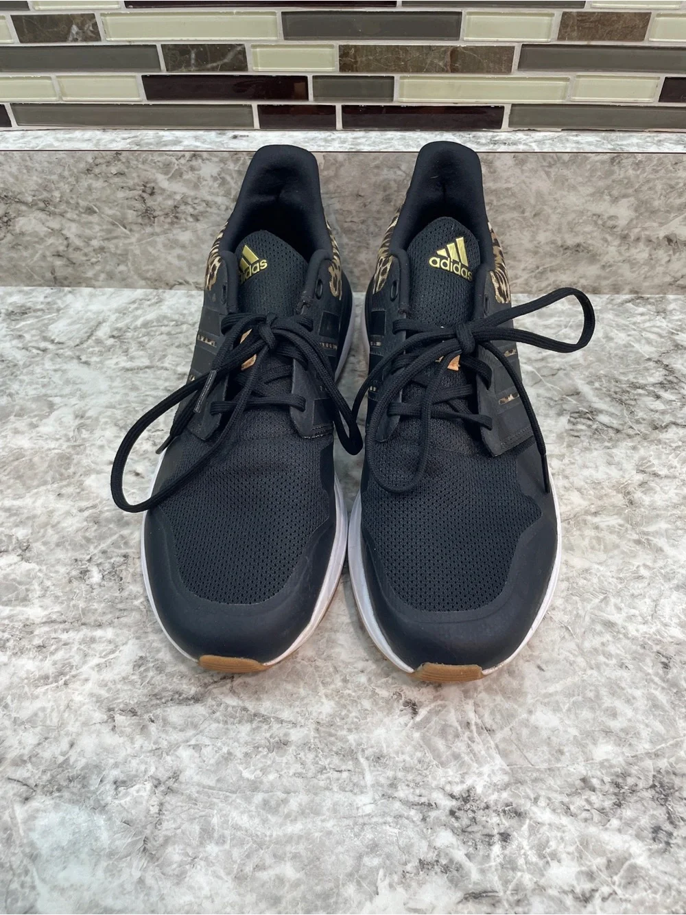 Adidas RapidaSport leapord print kids size 6.5